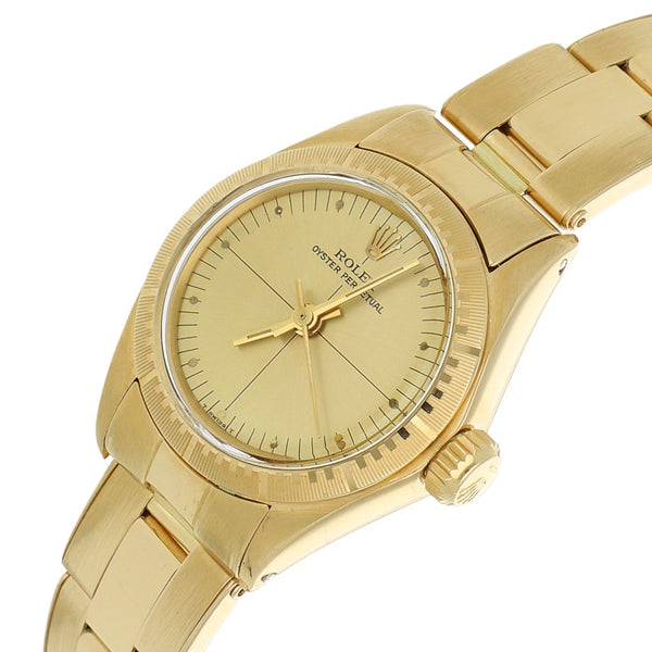 Reloj Rolex para dama modelo Oyster Perpetual en oro amarillo 18 kilates.