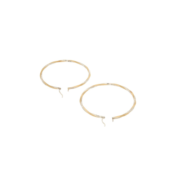 Arracadas torzales platinadas en oro amarillo 14 kilates.