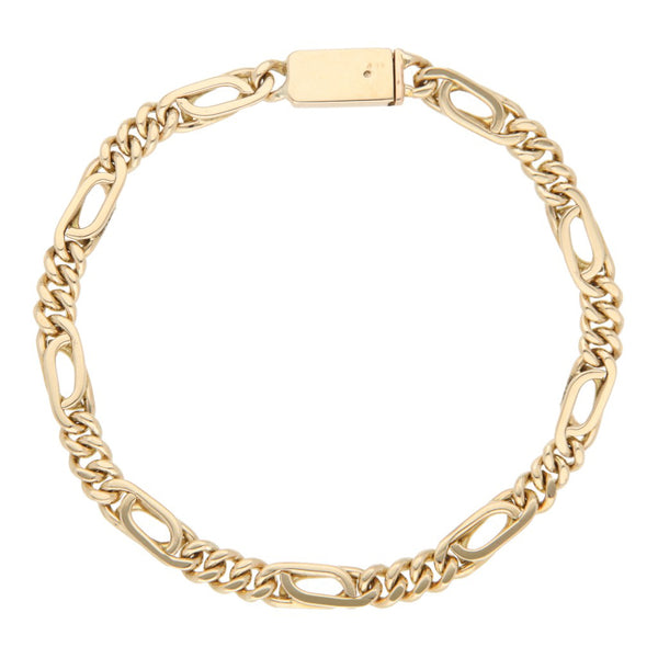 Pulsera eslabón combinado en oro amarillo 14 kilates.