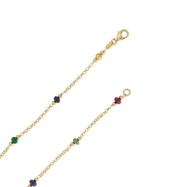 Collar eslabón cruzado con aplicaciones, esmeraldas, rubíes y zafiros en oro amarillo 18 kilates.