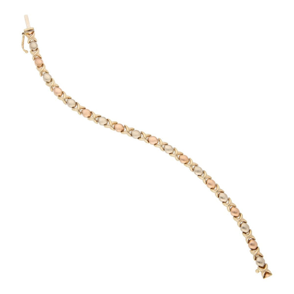 Pulsera eslabón XOXO en oro tres amarillo 14 kilates.