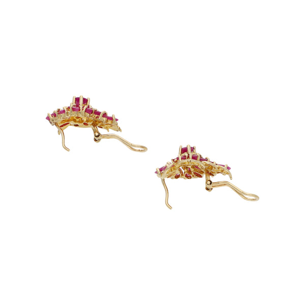 Aretes diseño especial con rubíes en oro amarillo 14 kilates.