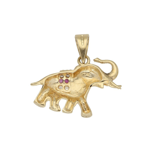 Dije labrado motivo elefante con sintéticos en oro amarillo 12 kilates.