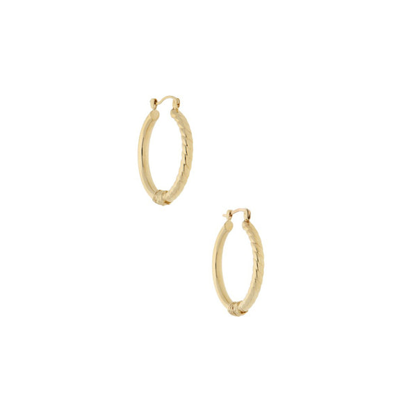 Arracadas tubulares en oro amarillo 14 kilates.