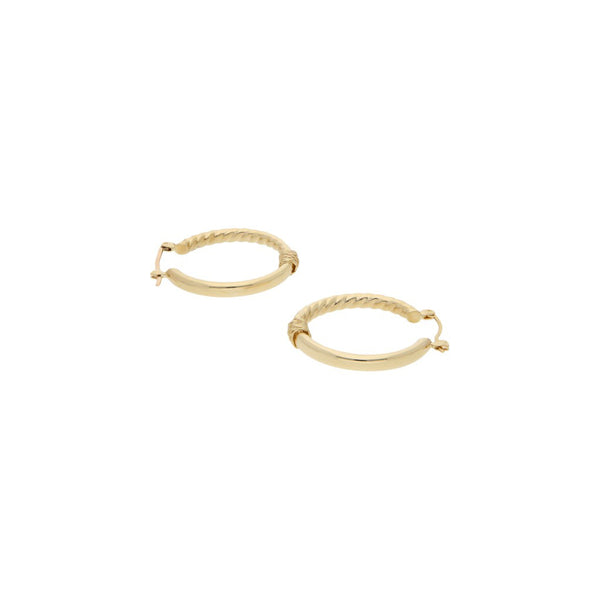 Arracadas tubulares en oro amarillo 14 kilates.