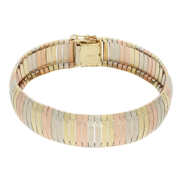 Pulsera eslabón planchado en oro tres tonos 14 kilates.