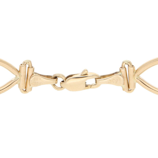 Pulsera eslabón articulado en oro amarillo 14 kilates.