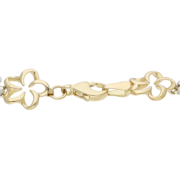 Pulsera eslabón articulado motivo flor en oro tres tonos 14 kilates.