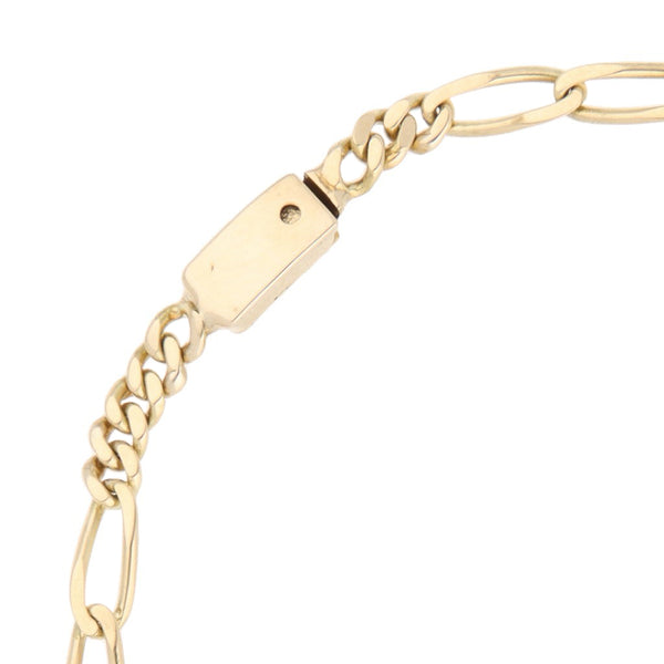Pulsera de seis eslabones por tres en oro amarillo 14 kilates.