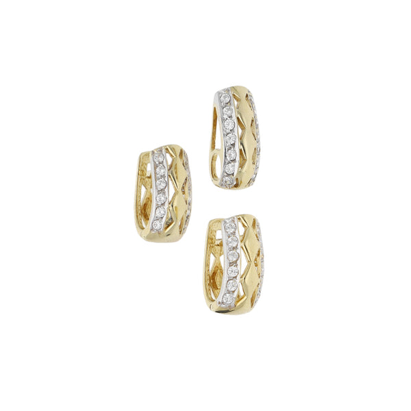 Juego de dije y aretes diseño especial con circonias en oro amarillo 14 kilates.