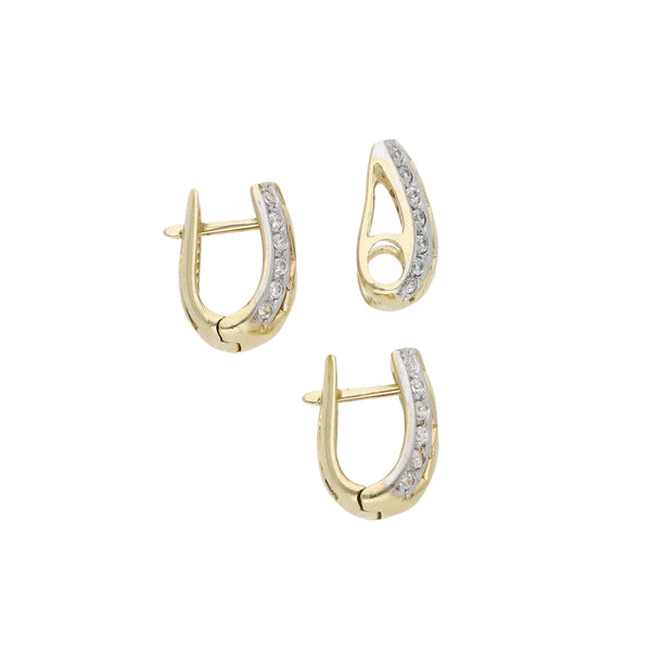 Juego de dije y aretes diseño especial con circonias en oro amarillo 14 kilates.