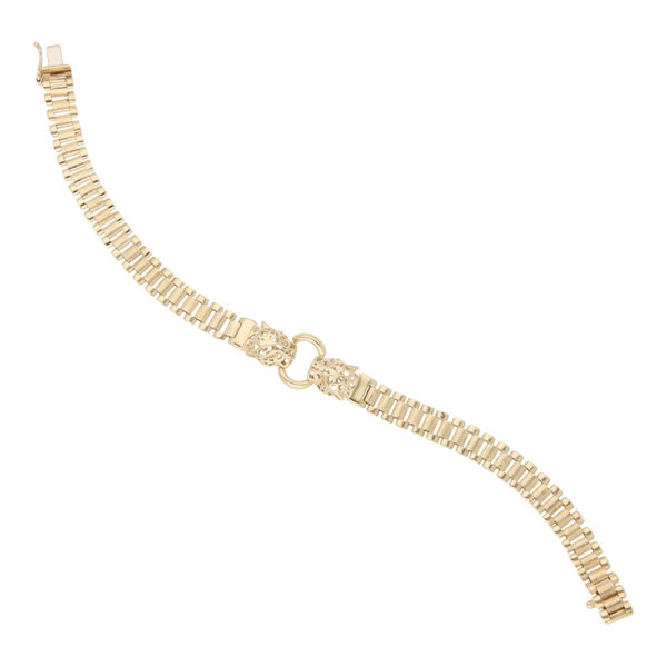 Pulsera eslabón articulado con aplicaciones motivo felinos y circonias en oro amarillo 14 kilates.