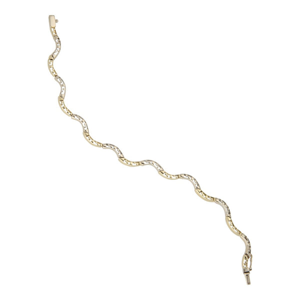 Pulsera eslabón articulado en oro dos tonos 14 kilates.