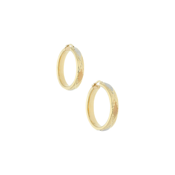 Arracadas labradas en oro amarillo 14 kilates.