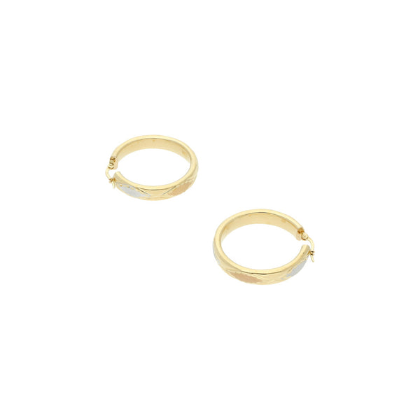 Arracadas labradas en oro amarillo 14 kilates.