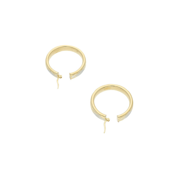 Arracadas labradas en oro amarillo 14 kilates.