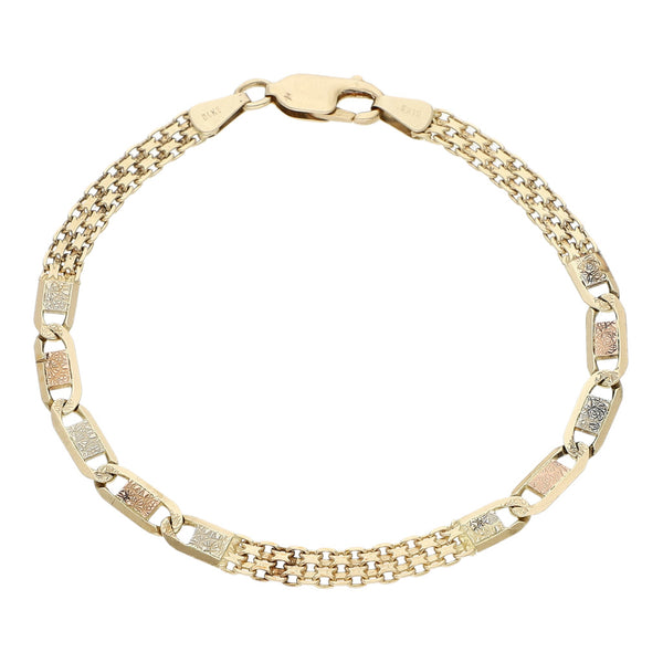 Pulsera eslabón combinado en oro amarillo 14 kilates.