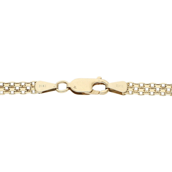 Pulsera eslabón combinado en oro amarillo 14 kilates.
