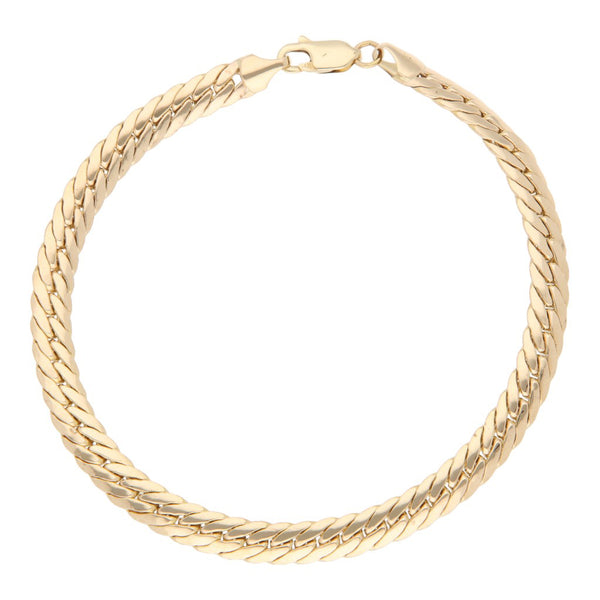 Pulsera eslabón barbado en oro amarillo 14 kilates.