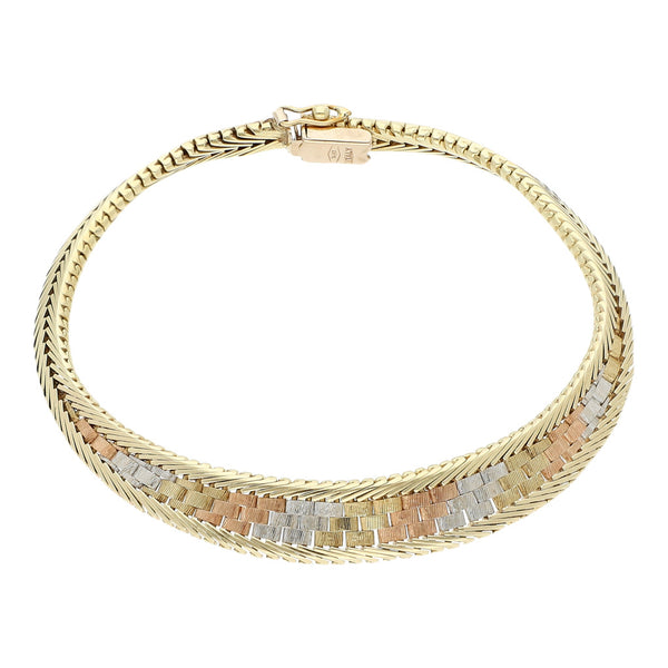 Pulsera eslabón planchado en oro tres tonos 14 kilates.
