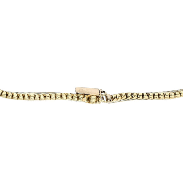 Pulsera eslabón planchado en oro tres tonos 14 kilates.