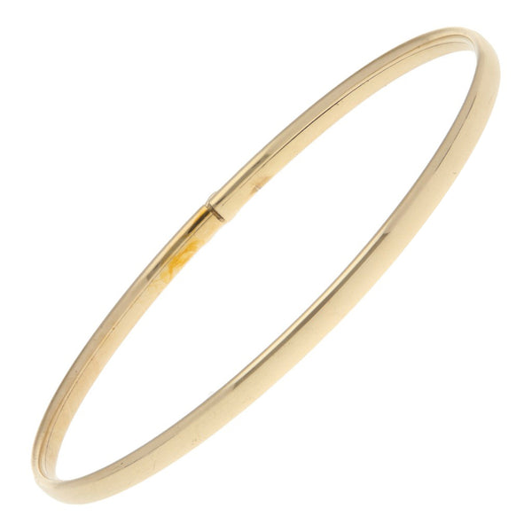 Pulsera de arillo laminada en oro amarillo 14 kilates.
