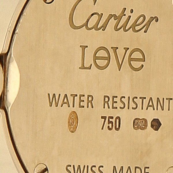 Reloj Cartier para dama modelo Love caja y broche en oro amarillo 18 kilates.