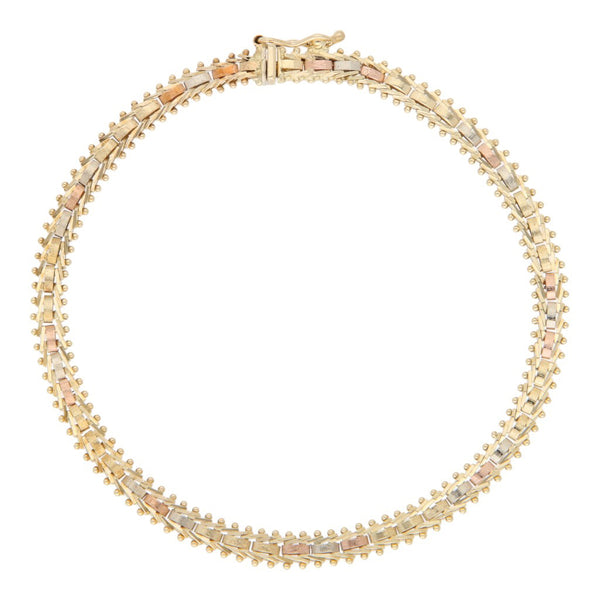 Pulsera eslabón boleado en oro tres tonos 14 kilates.