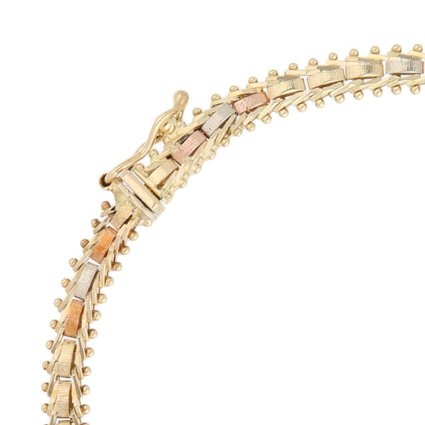 Pulsera eslabón boleado en oro tres tonos 14 kilates.