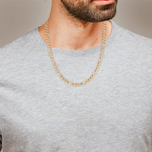 Collar de tres eslabones por uno en oro amarillo 14 kilates.