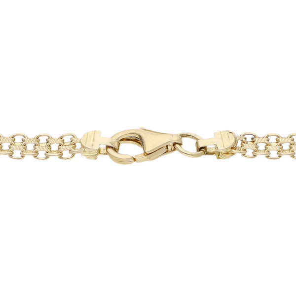 Pulsera eslabón tejido con aplicaciones motivo corazón en oro tres tonos 14 kilates.
