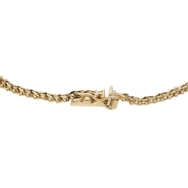 Pulsera eslabón boleado en oro tres tonos 14 kilates.