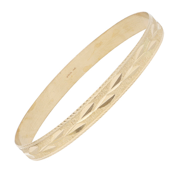 Pulsera de arillo labrada en oro amarillo 14 kilates.