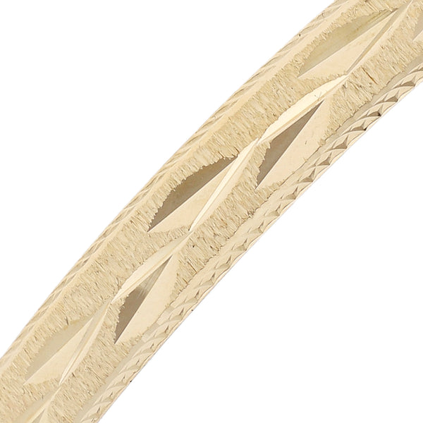 Pulsera de arillo labrada en oro amarillo 14 kilates.