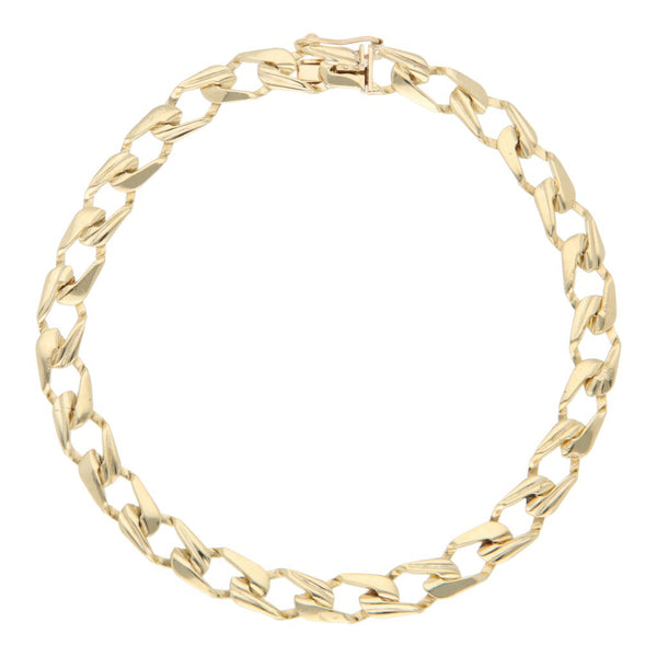 Pulsera eslabón barbado en oro amarillo 14 kilates.