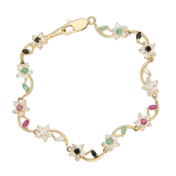 Pulsera eslabón articulado con aplicaciones de flores y sintéticos en oro amarillo 14 kilates.