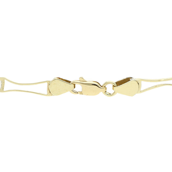 Pulsera eslabón articulado motivo delfín en oro tres tonos 14 kilates.