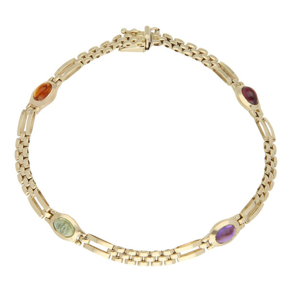 Pulsera eslabón articulado con aplicaciones de sintéticos en oro amarillo 14 kilates.