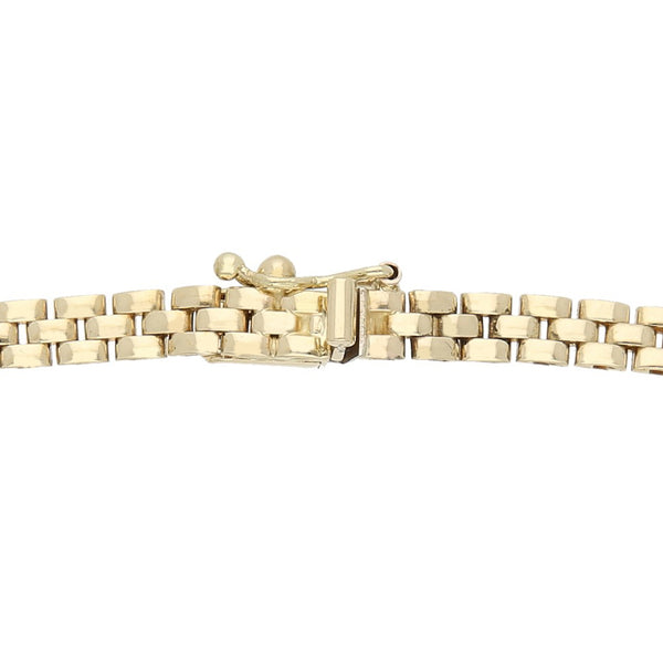 Pulsera eslabón articulado con aplicaciones de sintéticos en oro amarillo 14 kilates.
