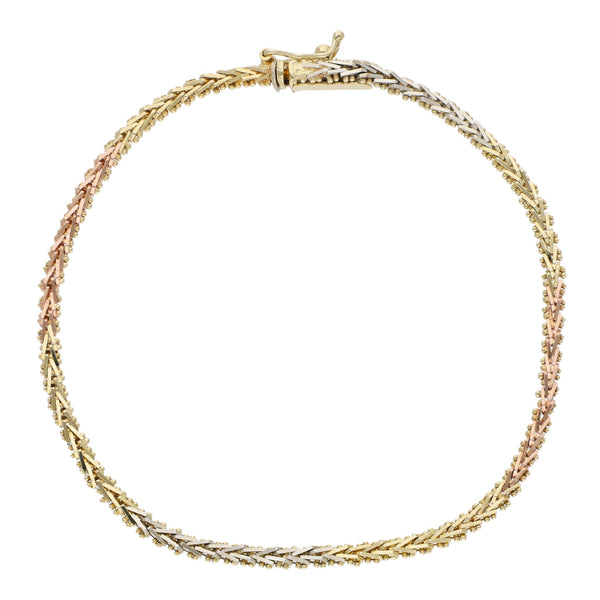 Pulsera eslabón boleado en oro tres tonos 14 kilates.