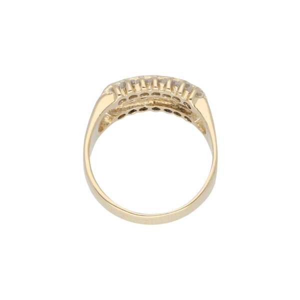Anillo diseño especial con esmeraldas y sintéticos en oro amarillo 14 kilates.