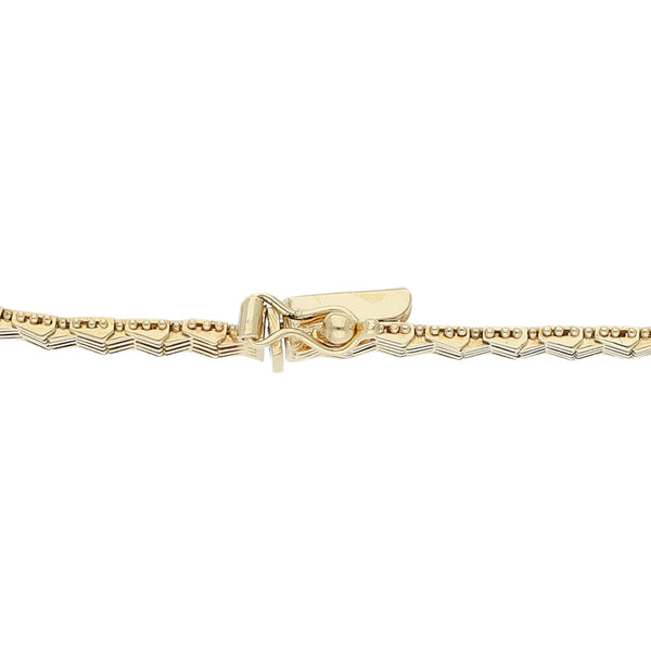 Pulsera eslabón boleado en oro amarillo 14 kilates.