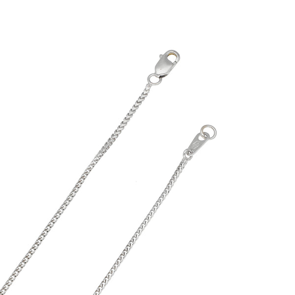 Collar eslabón encontrado y colgantes motivo figuras geométricas con diamantes en oro blanco 18 kilates.
