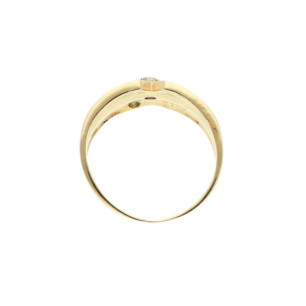 Anillo diseño especial motivo flor con circonias en oro amarillo 14 kilates.