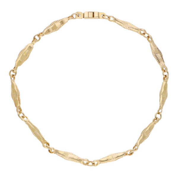 Pulsera eslabón articulado en oro amarillo 14 kilates.