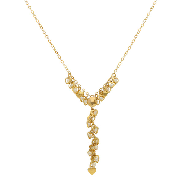 Gargantilla eslabón cruzado con colgantes motivo corazón y perlas en oro amarillo 14 kilates.