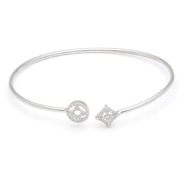 Pulsera de arillo abierta con diamantes en oro blanco 14 kilates.