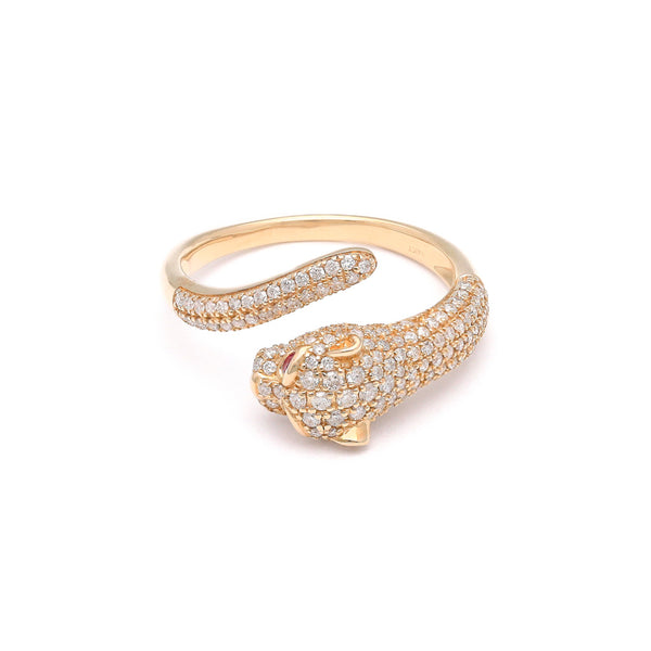 Anillo abierto motivo pantera con diamantes y rubí en oro amarillo 14 kilates.