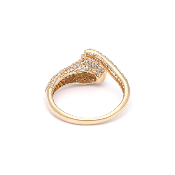 Anillo diseño especial con diamantes y esmeraldas motivo pantera en oro amarillo 14 kilates.