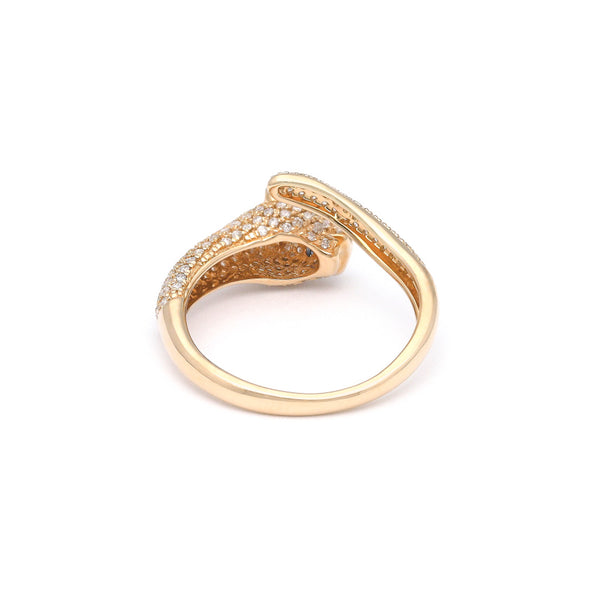 Anillo diseño especial motivo felino con diamantes y zafiros en oro amarillo 14 kilates.